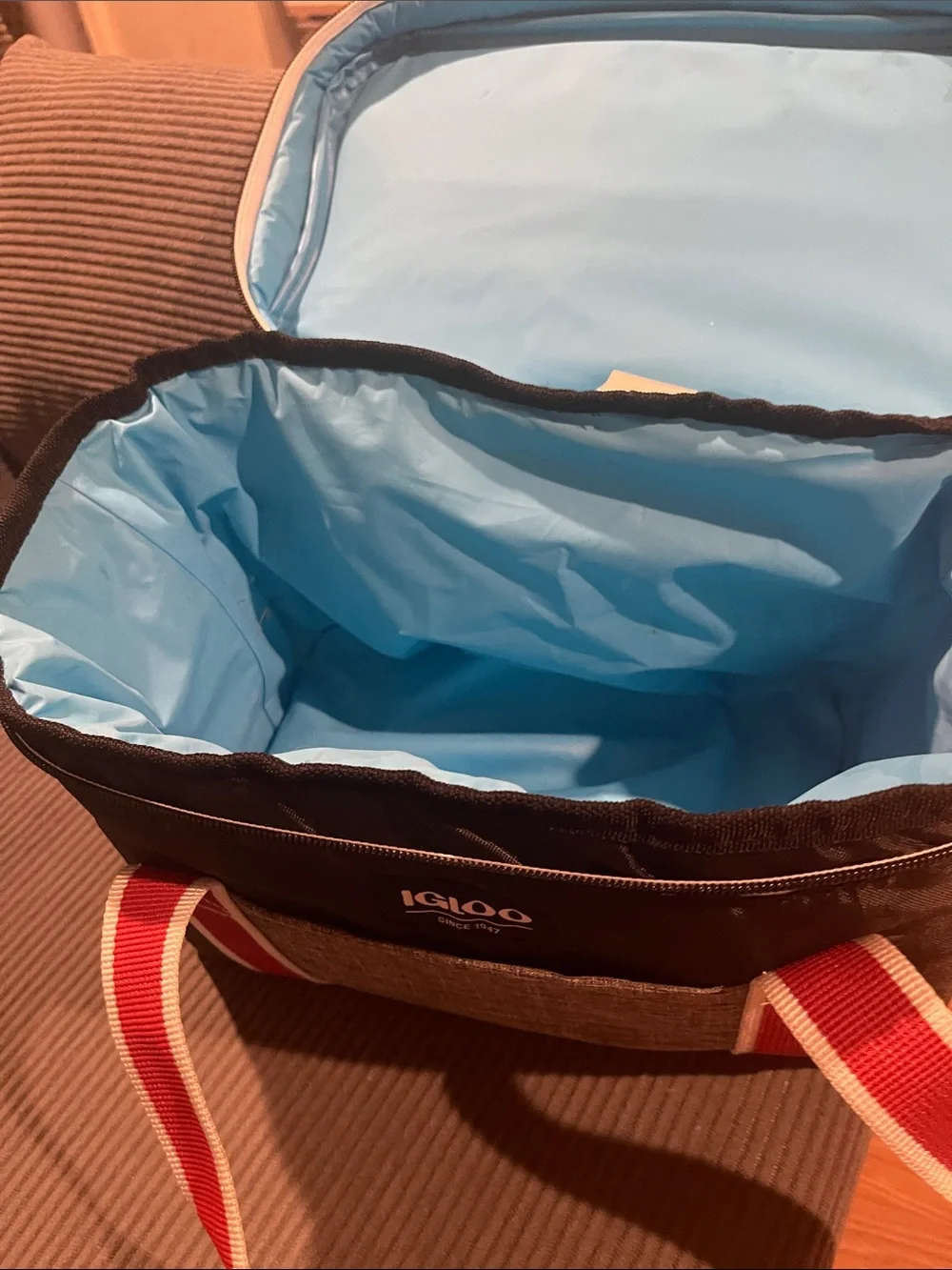 Igloo Black Duffel Cooler with Red and White Straps